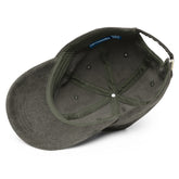 A view of the inside of an olive green Xigfireon vintage corduroy cap.