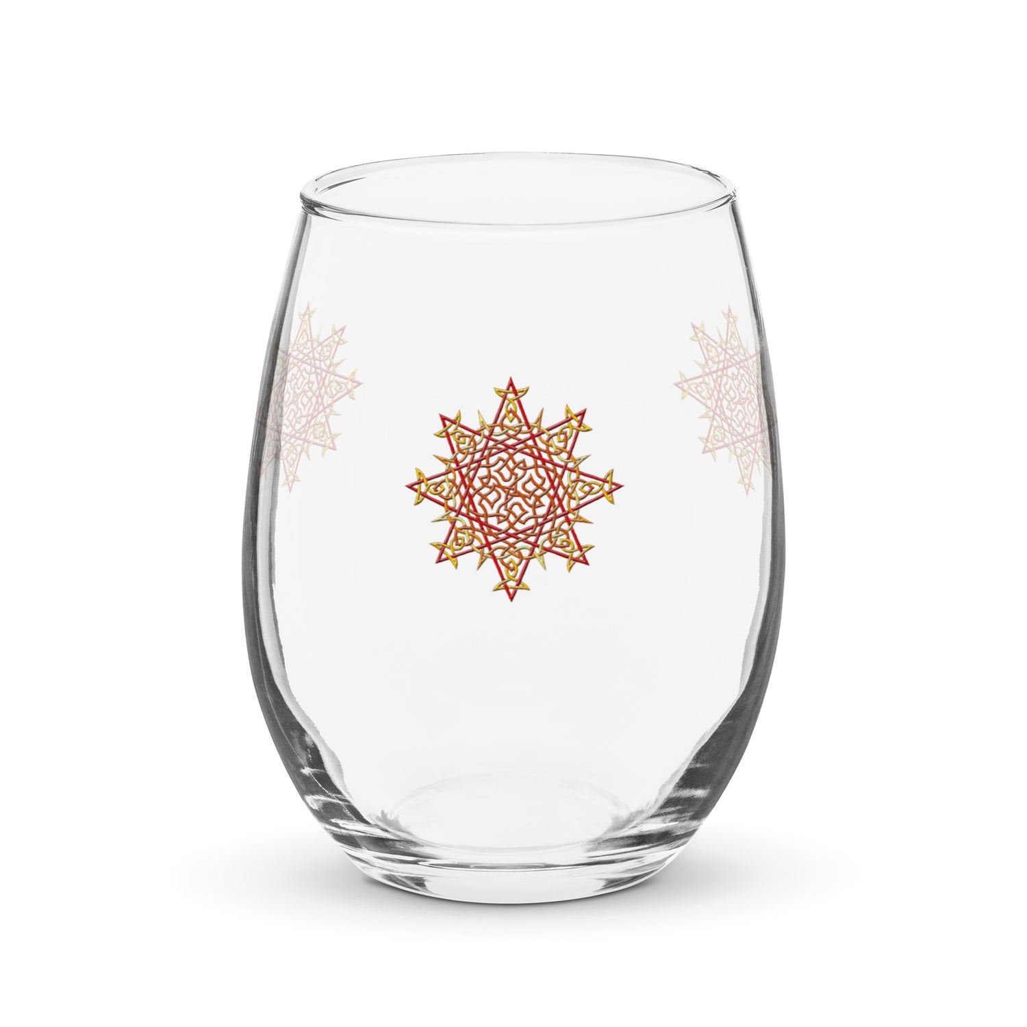 The front side of a stemless wine glass featuring the Fire Colour iteration of the `Morning Star Fire` Celtic knot design.