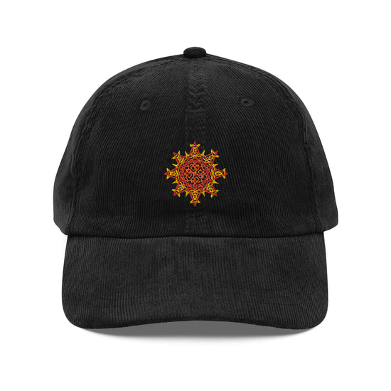 The front side of a black Xigfireon vintage corduroy cap embroidered with the Fire Colour iteration of the `Morning Star Fire` Celtic knot design.