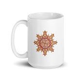 A Xigfireon white ceramic 15oz mug featuring the Fire Colour iteration of the `Morning Star Fire` Celtic knot design. This Celtic knot symbolizes Father Sun.