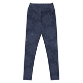 The front side of a pair of Xigfireon graphic yoga leggings featuring the Midnight Blue Cosmos patterned series of the `Morning Star Fire` Celtic knot design.