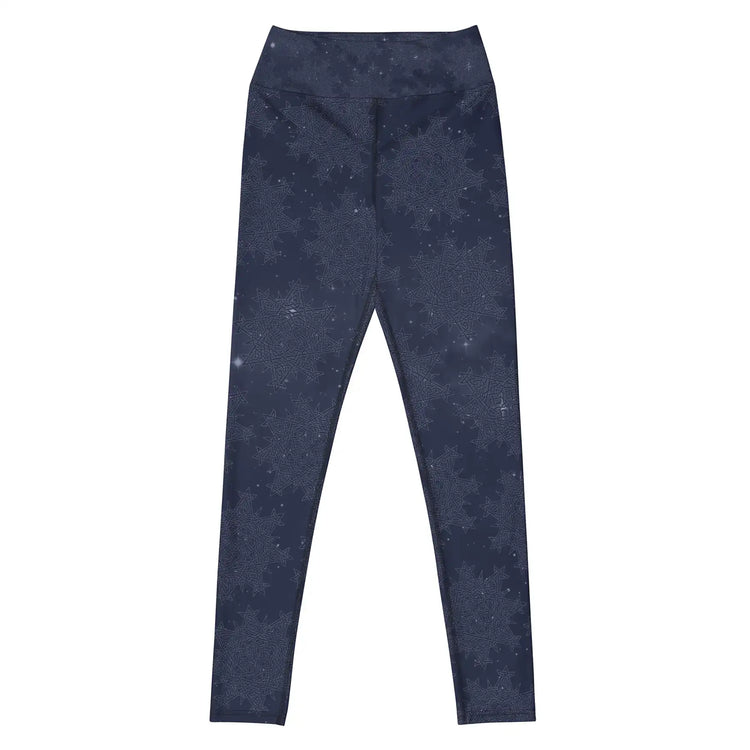 The front side of a pair of Xigfireon graphic yoga leggings featuring the Midnight Blue Cosmos patterned series of the `Morning Star Fire` Celtic knot design.