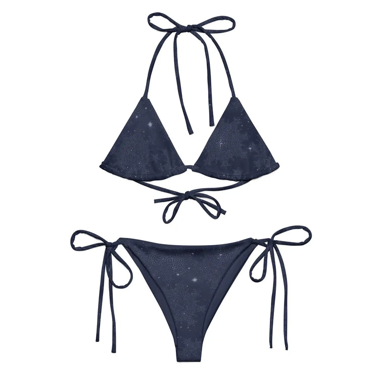 A view of the outside of a string bikini featuring the Midnight Blue Cosmos iteration of the `Morning Star Fire` Celtic knot pattern.