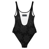The back side of a Xigfireon graphic swimsuit featuring the Midnight Cosmos patterned series of the `Morning Star Fire` Celtic knot design.