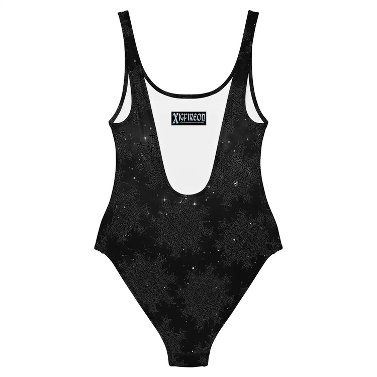 The back side of a Xigfireon graphic swimsuit featuring the Midnight Cosmos patterned series of the `Morning Star Fire` Celtic knot design.