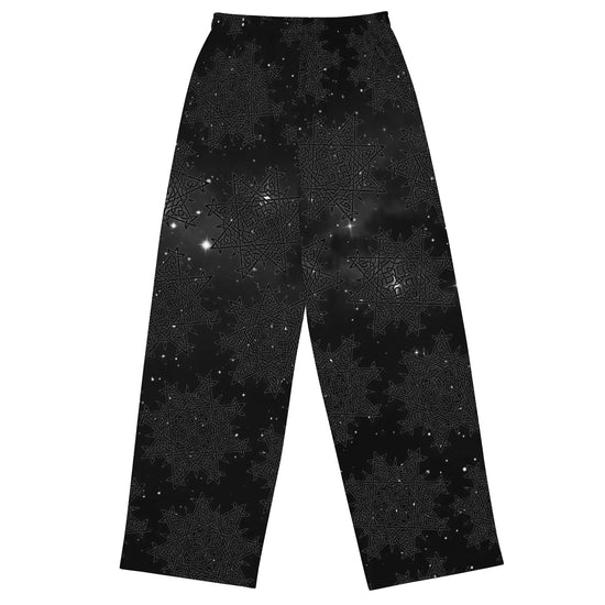 The back side of a pair of Xigfireon graphic wide leg pants featuring the Midnight Cosmos patterned series of the `Morning Star Fire` Celtic knot design.