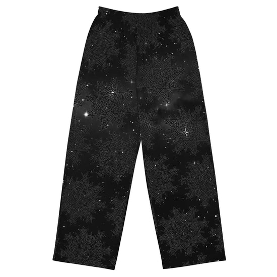 The front side of a pair of Xigfireon graphic wide leg pants featuring the Midnight Cosmos patterned series of the `Morning Star Fire` Celtic knot design.