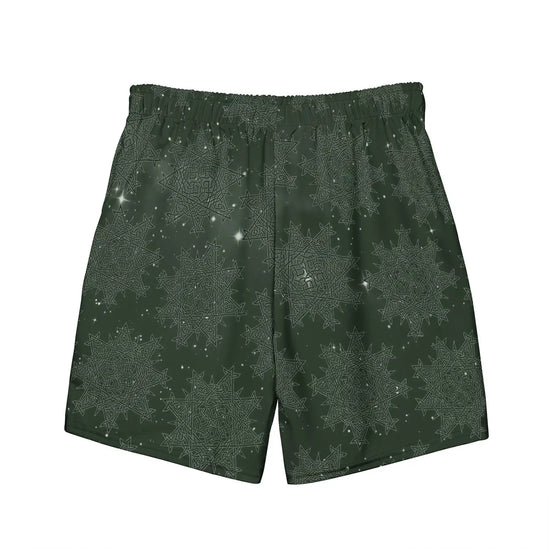 The back side of a pair of Xigfireon graphic swim trunks featuring the Midnight Freen Cosmos patterned series of the `Morning Star Fire` Celtic knot design.