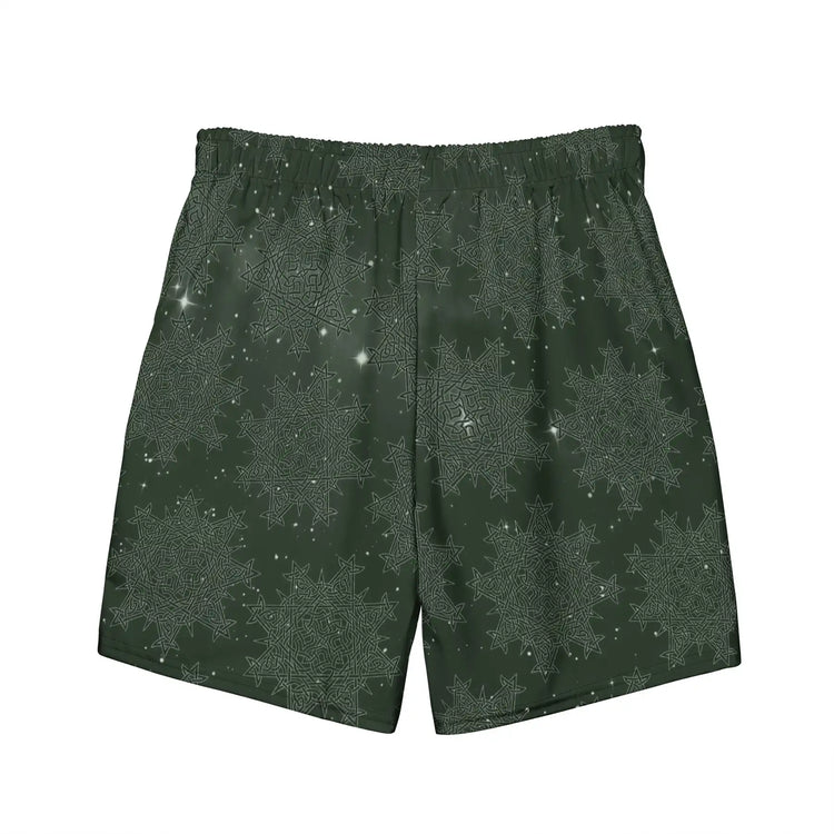 The back side of a pair of Xigfireon graphic swim trunks featuring the Midnight Freen Cosmos patterned series of the `Morning Star Fire` Celtic knot design.