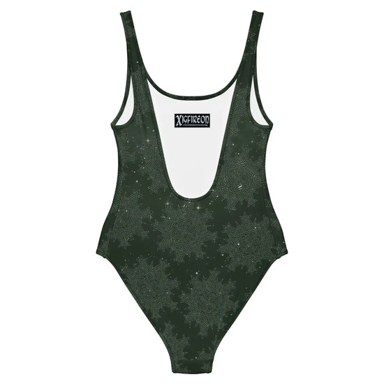 The back side of a Xigfireon graphic swimsuit featuring the Midnight Green Cosmos patterned series of the `Morning Star Fire` Celtic knot design.