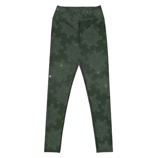 The front side of a pair of Xigfireon graphic yoga leggings featuring the Midnight Green Cosmos patterned series of the `Morning Star Fire` Celtic knot design.
