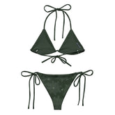 A view of the inside of a string bikini featuring the Midnight Green Solid Cosmos iteration of the `Morning Star Fire` Celtic knot pattern.