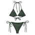 A view of the outside of a string bikini featuring the Midnight Green Solid Cosmos iteration of the `Morning Star Fire` Celtic knot pattern.