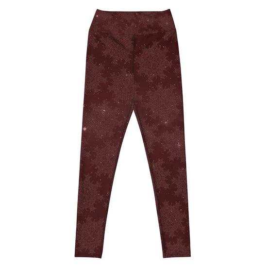 The front side of a pair of Xigfireon graphic yoga leggings featuring the Midnight Red Cosmos patterned series of the `Morning Star Fire` Celtic knot design.