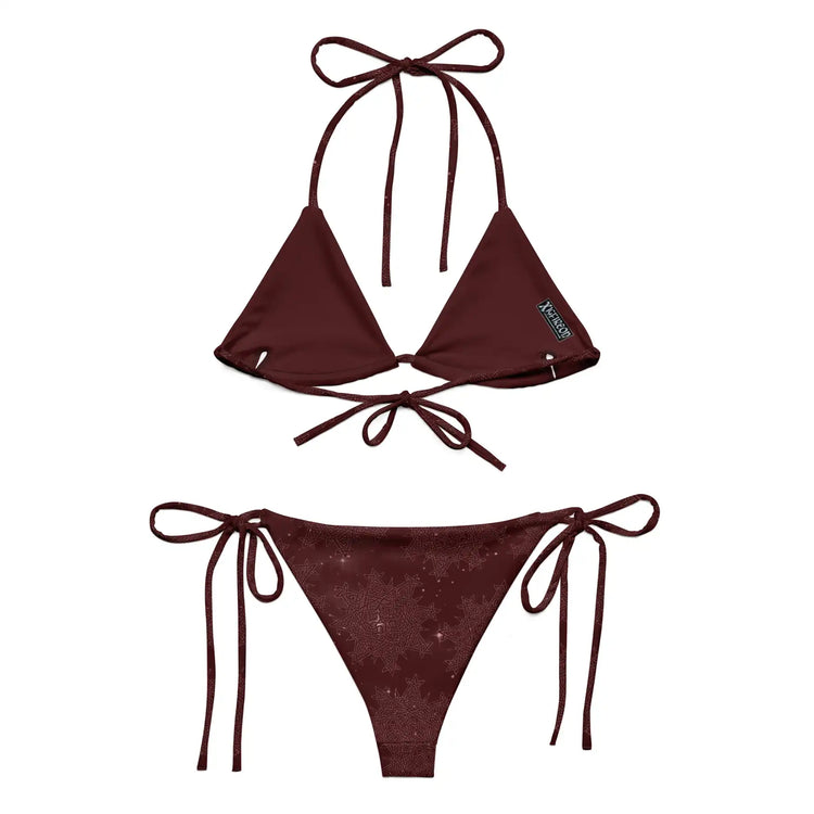 A view of the inside of a Xigfireon string bikini featuring the Midnight Red Cosmos iteration of the `Morning Star Fire` Celtic knot pattern.