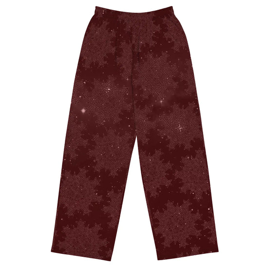 The front side of a pair of Xigfireon graphic wide leg pants featuring the Midnight Red Cosmos patterned series of the `Morning Star Fire` Celtic knot design.