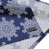 A close up view of the Xigfireon logo on a large sized (25.25 inch x 25.25 inch) `Morning Star Fire` Navy Blue and White bandana.