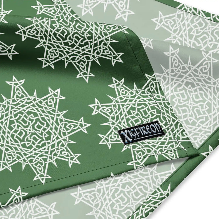A close up view of the Xigfireon logo on a large sized (25.25 inch x 25.25 inch) `Morning Star Fire` Olive Green and White bandana.
