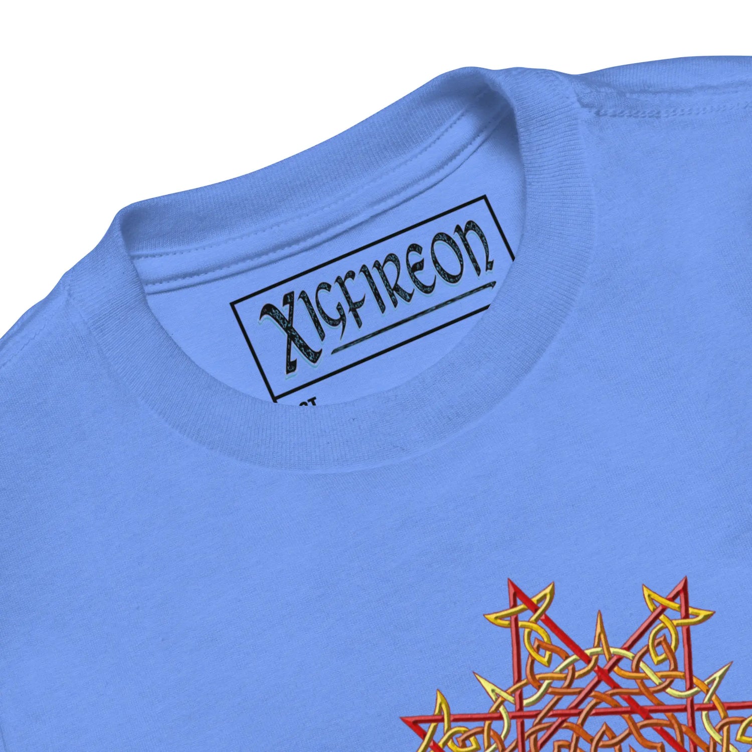 A close-up view of the logo and design on a heather Columbia blue Xigfireon toddler graphic t-shirt featuring the Fire Colour iteration of the `Morning Star Fire` Celtic knot design. The `Morning Star Fire` Celtic knot symbolizes Father Sun.