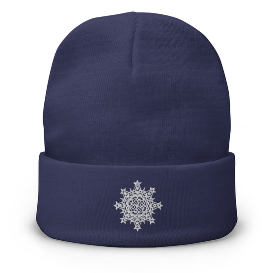 A navy blue Xigfireon knit beanie embroidered with the White iteration of the `Morning Star Fire` Celtic knot design.