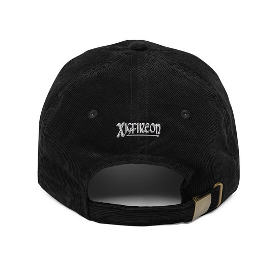 The back side of a black Xigfireon vintage corduroy cap showing the embroidered Xigfireon logo.