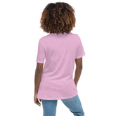 A young woman, viewed from behind, wearing a heather prism lilac Xigfireon woman&