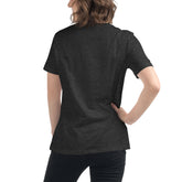 A young woman, viewed from behind, wearing a dark grey heather Xigfireon woman&