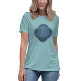 A young woman wearing a heather blue lagoon Xigfireon woman&