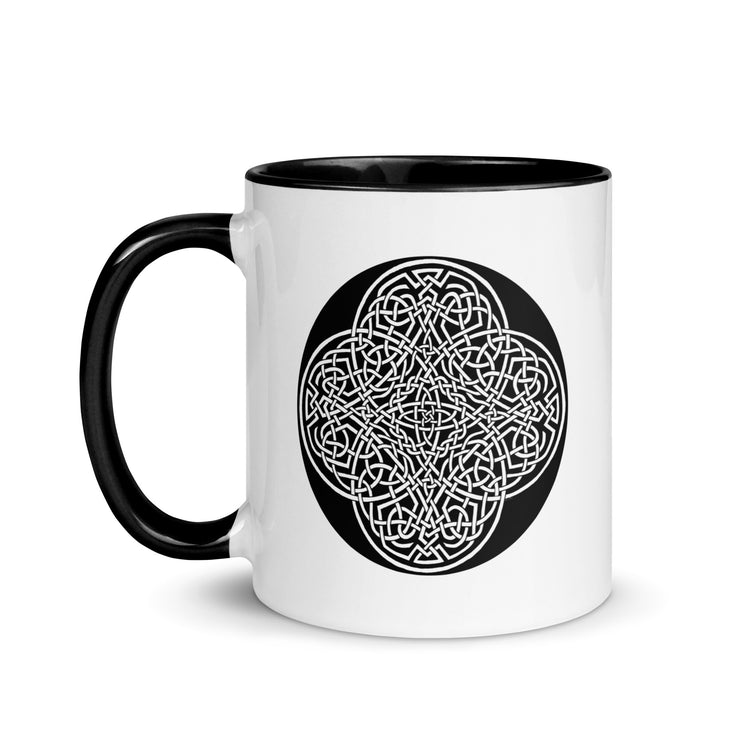 A Xigfireon white ceramic 11oz mug featuring the Black & White Circle iteration of the `Reach Of The Spirit` Celtic knot design, with black handle and inside. This Celtic knot symbolizes Mother Earth.