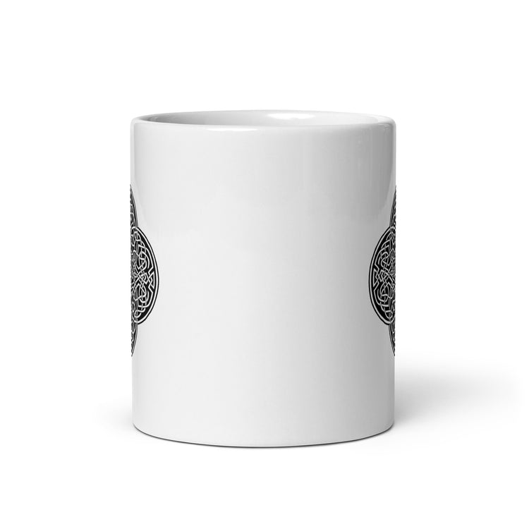 The front side of a Xigfireon white glossy 11oz mug featuring the Black & White Solid iteration of the `Reach Of The Spirit` Celtic knot design. This Celtic knot symbolizes Mother Earth.