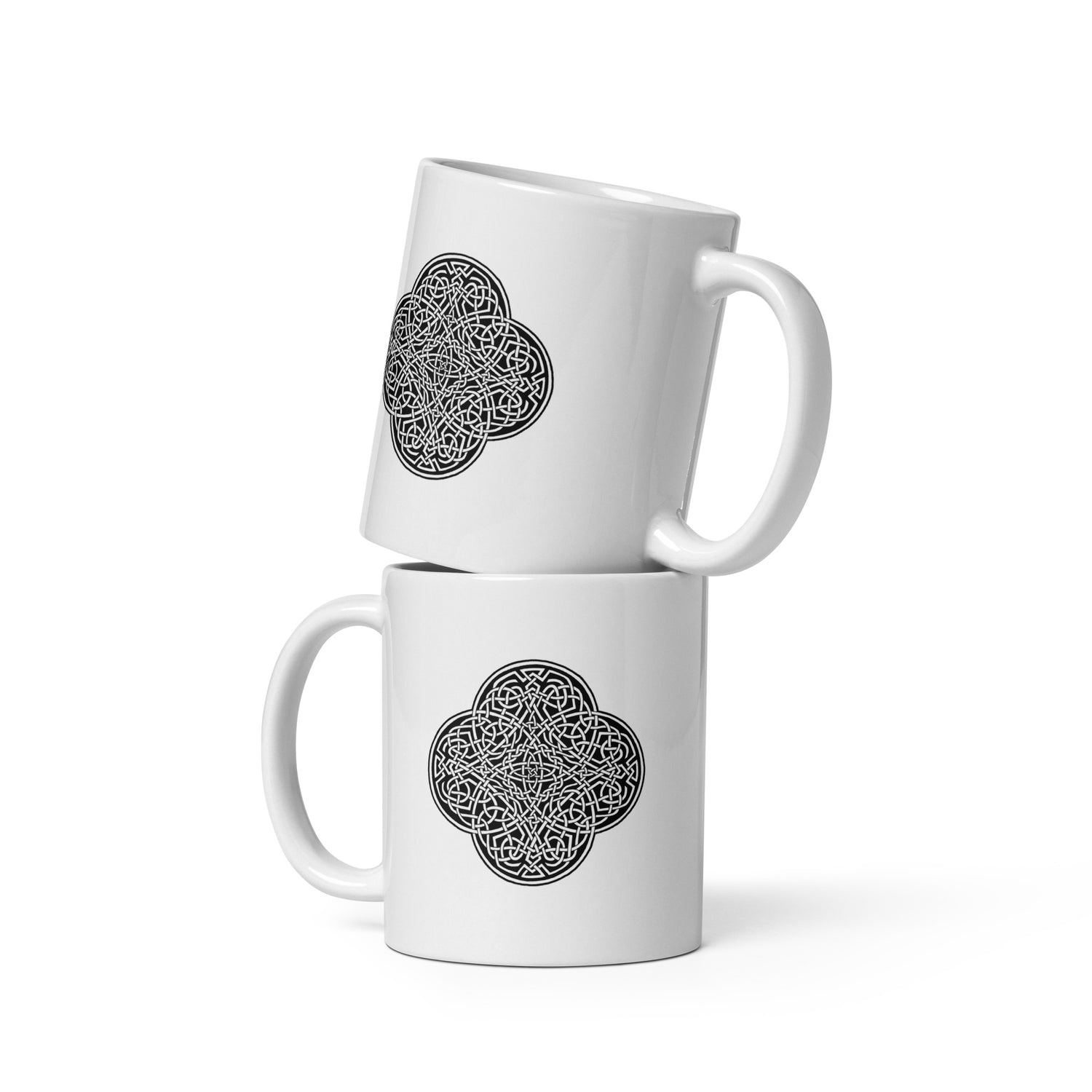 A stack of two Xigfireon white glossy 11oz mugs featuring the Black & White Solid iteration of the `Reach Of The Spirit` Celtic knot design. This Celtic knot symbolizes Mother Earth.