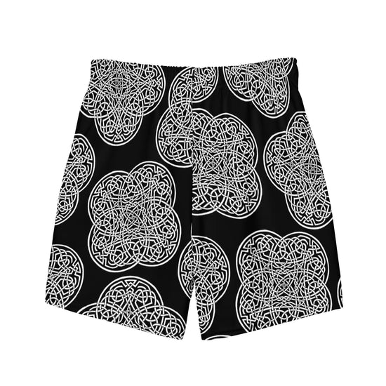 The back side of a pair of Xigfireon graphic swim trunks featuring the Black & White Solid Black patterned series of the `Reach Of The Spirit` Celtic knot design.