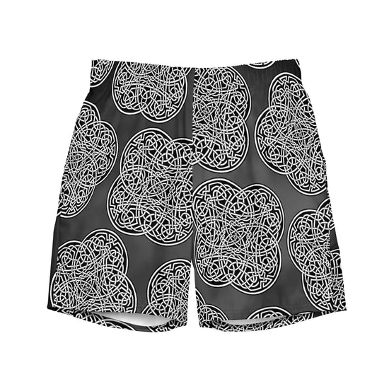 The front side of a pair of Xigfireon graphic swim trunks featuring the Black & White Solid Forest patterned series of the `Reach Of The Spirit` Celtic knot design.