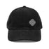 The front side of a black Xigfireon vintage corduroy cap embroidered with the Black & White Solid iteration of the `Reach Of The Spirit` Celtic knot design offset to the left.