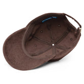 A view of the inside of a brown Xigfireon vintage corduroy cap.