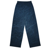 The back side of a pair of Xigfireon graphic wide leg pants featuring the Blue Slate iteration of the `Reach Of The Spirit` Celtic knot design.