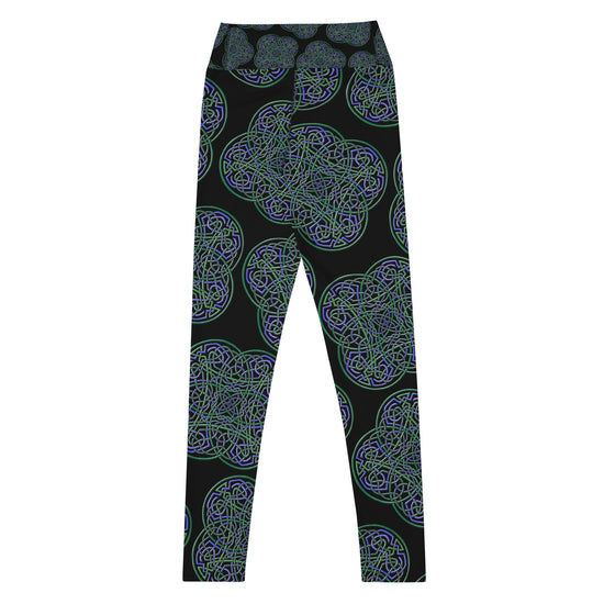 The back side of a pair of Xigfireon graphic yoga leggings featuring the Living Colour Black patterned series of the `Reach Of The Spirit` Celtic knot design.