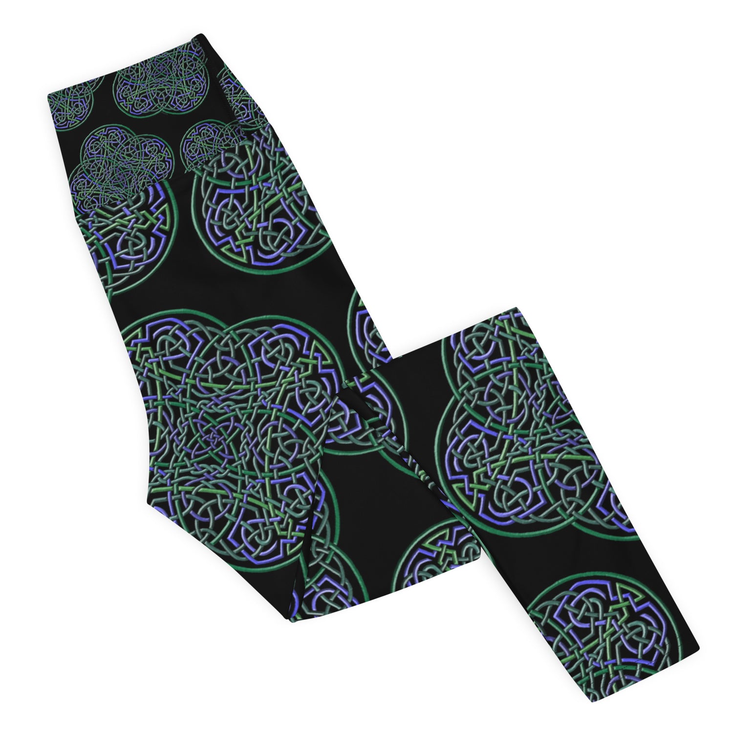 The right side of a folded pair of Xigfireon graphic yoga leggings featuring the Living Colour Black patterned series of the `Reach Of The Spirit` Celtic knot design.