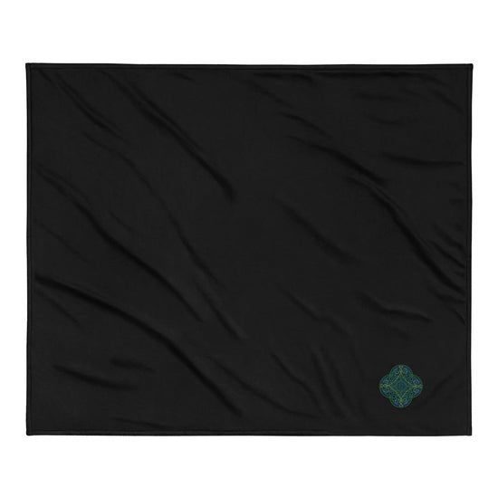 A black Xigfireon sherpa blanket embroidered with the Living Colour iteration of the `Reach Of The Spirit` Celtic knot design.