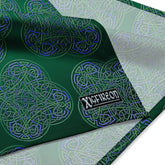 A close up view of the Xigfireon logo on a medium sized (21.25 inch x 21.25 inch) `Reach Of The Spirit` Living Colour forest bandana.