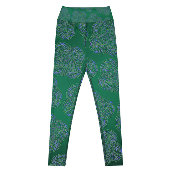 The front side of a pair of Xigfireon graphic yoga leggings featuring the Living Colour Forest patterned series of the `Reach Of The Spirit` Celtic knot design.