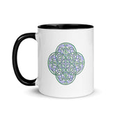 A Xigfireon white ceramic 11oz mug featuring the Living Colour iteration of the `Reach Of The Spirit` Celtic knot design, with black handle and inside. This Celtic knot symbolizes Mother Earth.