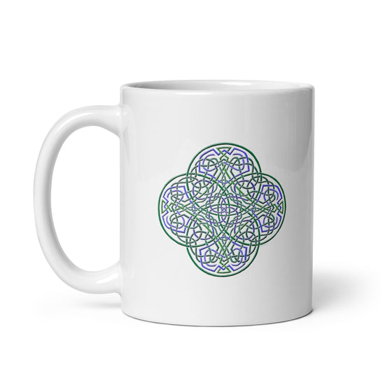 A Xigfireon white ceramic 11oz mug featuring the Living Colour iteration of the `Reach Of The Spirit` Celtic knot design. This Celtic knot symbolizes Mother Earth.