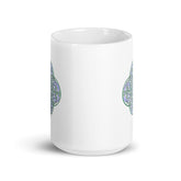 The front side of a Xigfireon white ceramic 15oz mug featuring the Living Colour iteration of the `Reach Of The Spirit` Celtic knot design. This Celtic knot symbolizes Mother Earth.