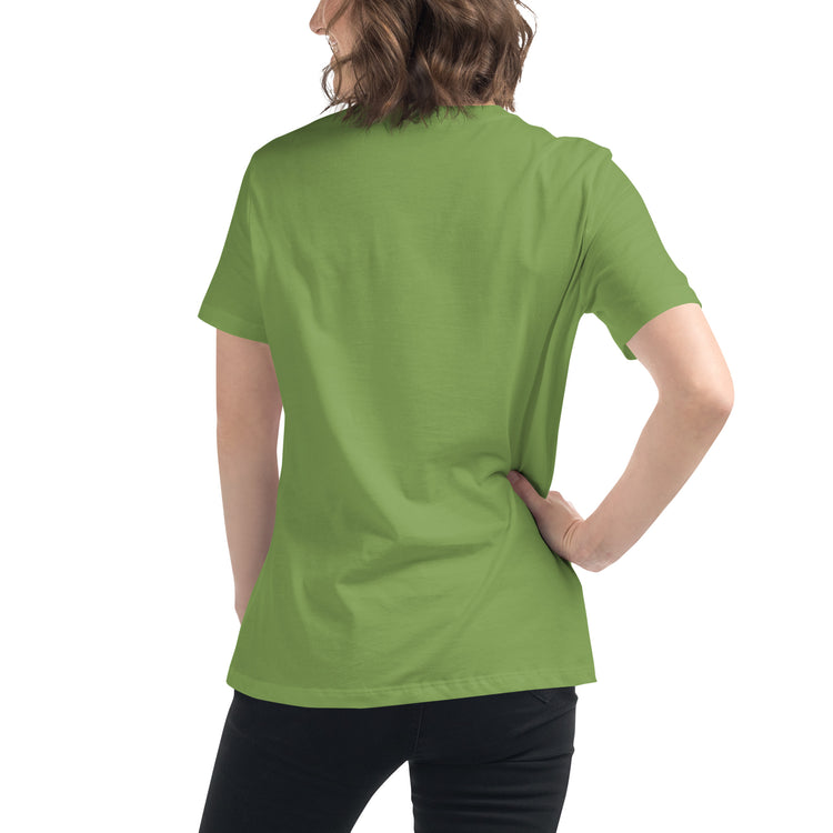 A young woman, viewed from behind, wearing a leaf green Xigfireon woman&