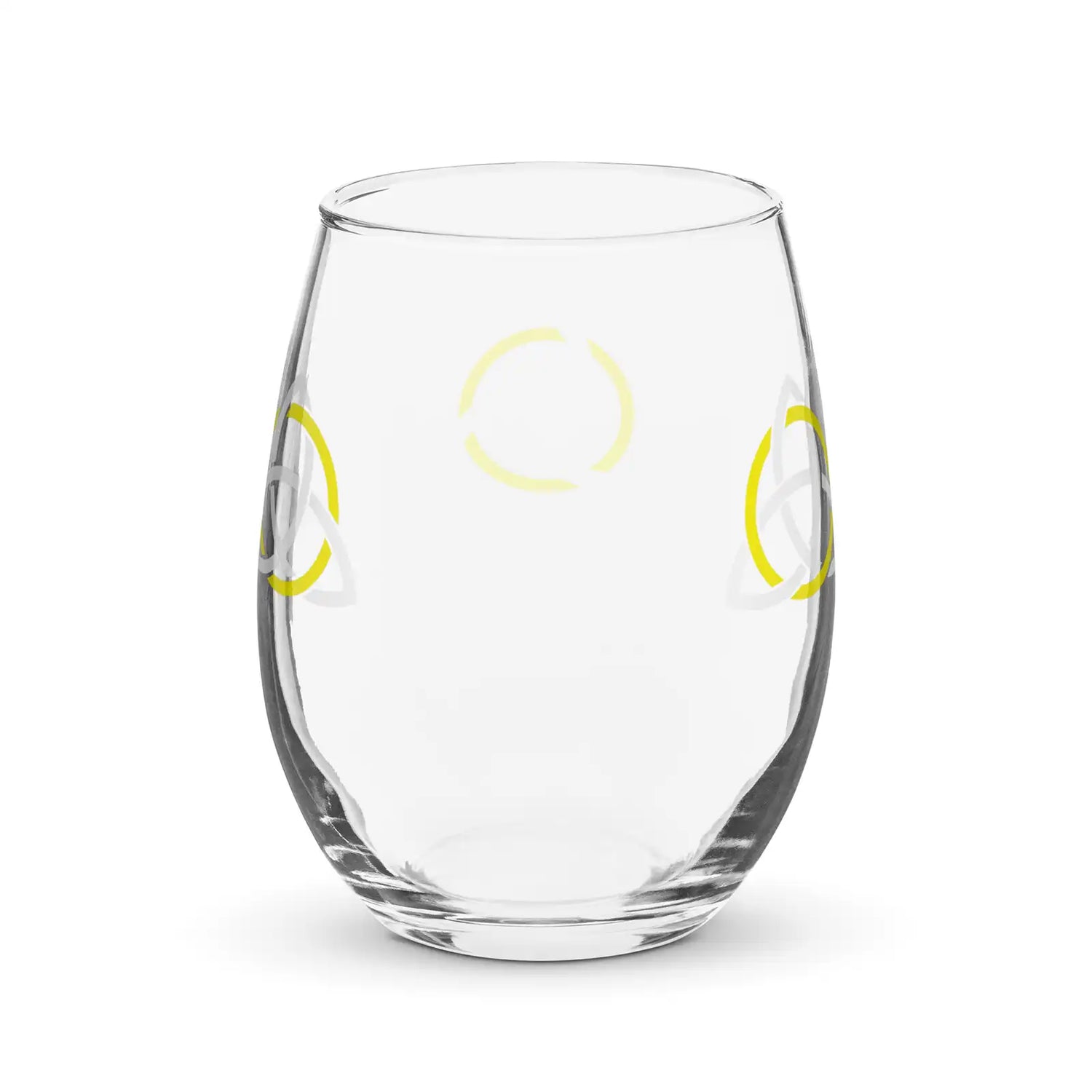 The back side of a stemless wine glass featuring the White & Gold iteration of the Trinity Knot design. The Trinity Knot, also called the triquetra, represents unity and balance.
