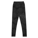 Celtic knot yoga leggings by Xigfireon, shown from the back, featuring the Midnight Cosmos patterned series of the `Morning Star Fire` design.