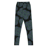 The back side of a pair of Xigfireon graphic yoga leggings featuring the Living Colour Black patterned series of the Reach Of The Spirit Celtic knot design.