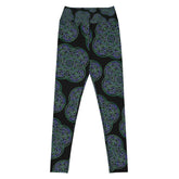 The front side of a pair of Xigfireon graphic yoga leggings featuring the Living Colour Black patterned series of the Reach Of The Spirit Celtic knot design.