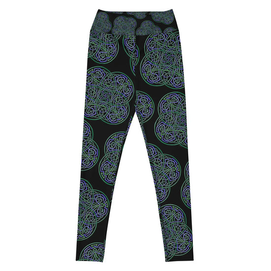 The front side of a pair of Xigfireon graphic yoga leggings featuring the Living Colour Black patterned series of the Reach Of The Spirit Celtic knot design.